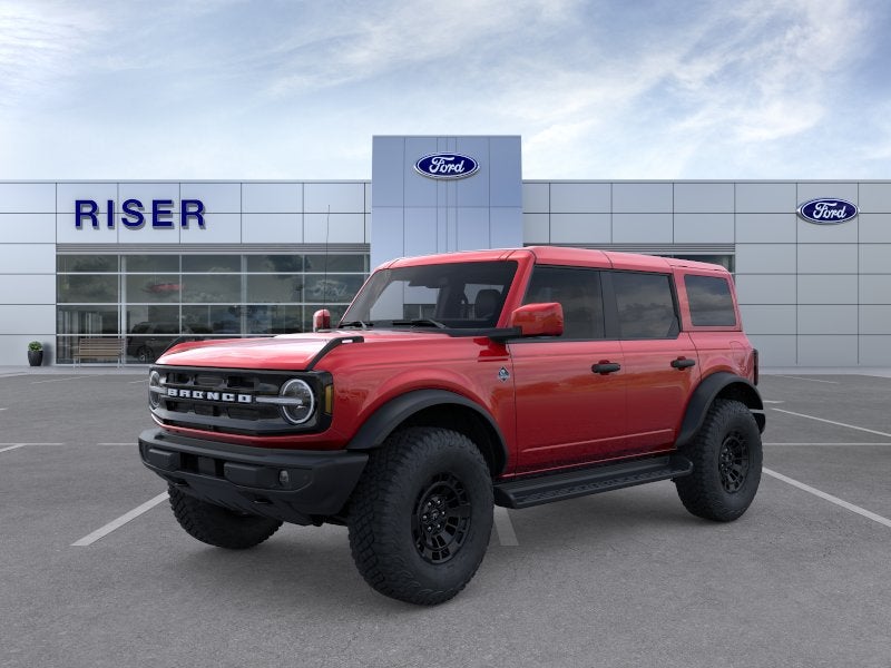 2026 Ford Bronco Outer Banks in Ruby Red Metallic Tinted Clearcoat — front three-quarter view