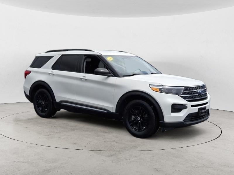 2024 Ford Explorer XLT in Star White Metallic Tri-Coat — front three-quarter view
