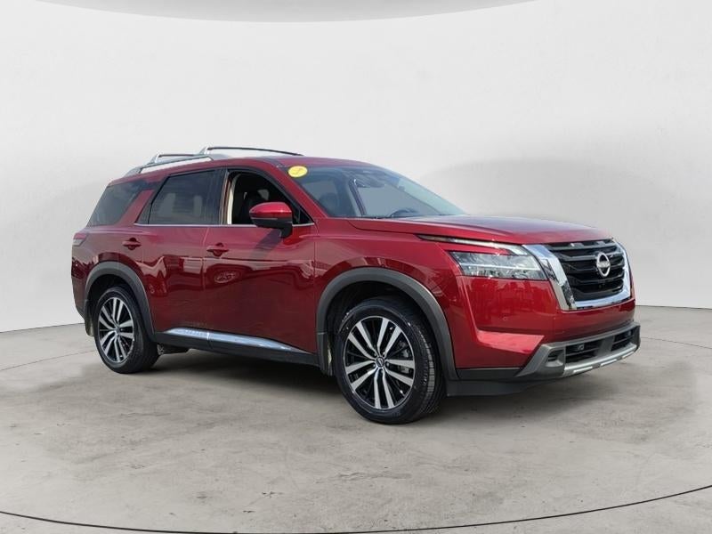 2024 Nissan Pathfinder Platinum in Scarlet Ember — front three-quarter view